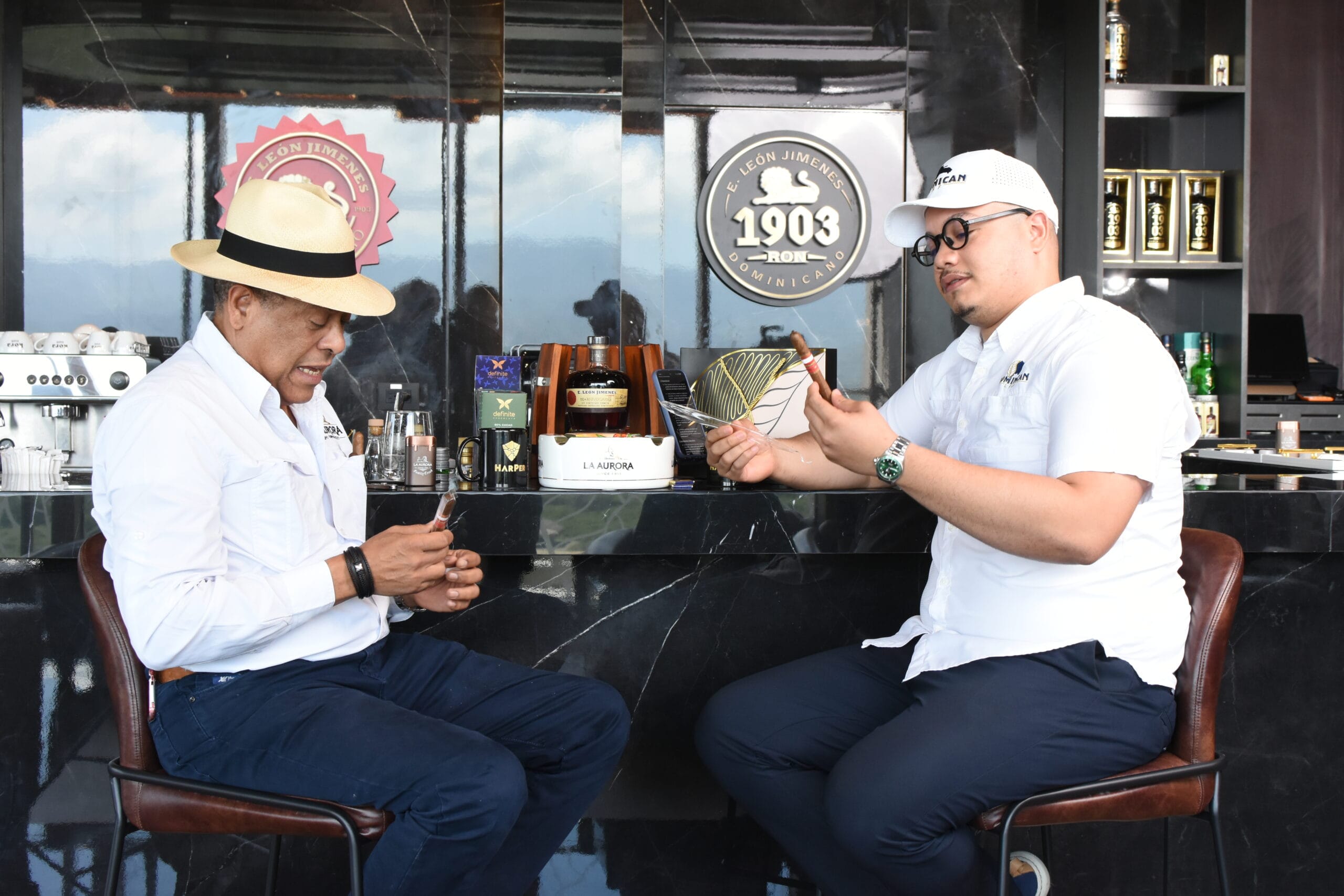 Manuel Inoa and Raudy Jimenez recording Detras del Humo podcast at La Aurora