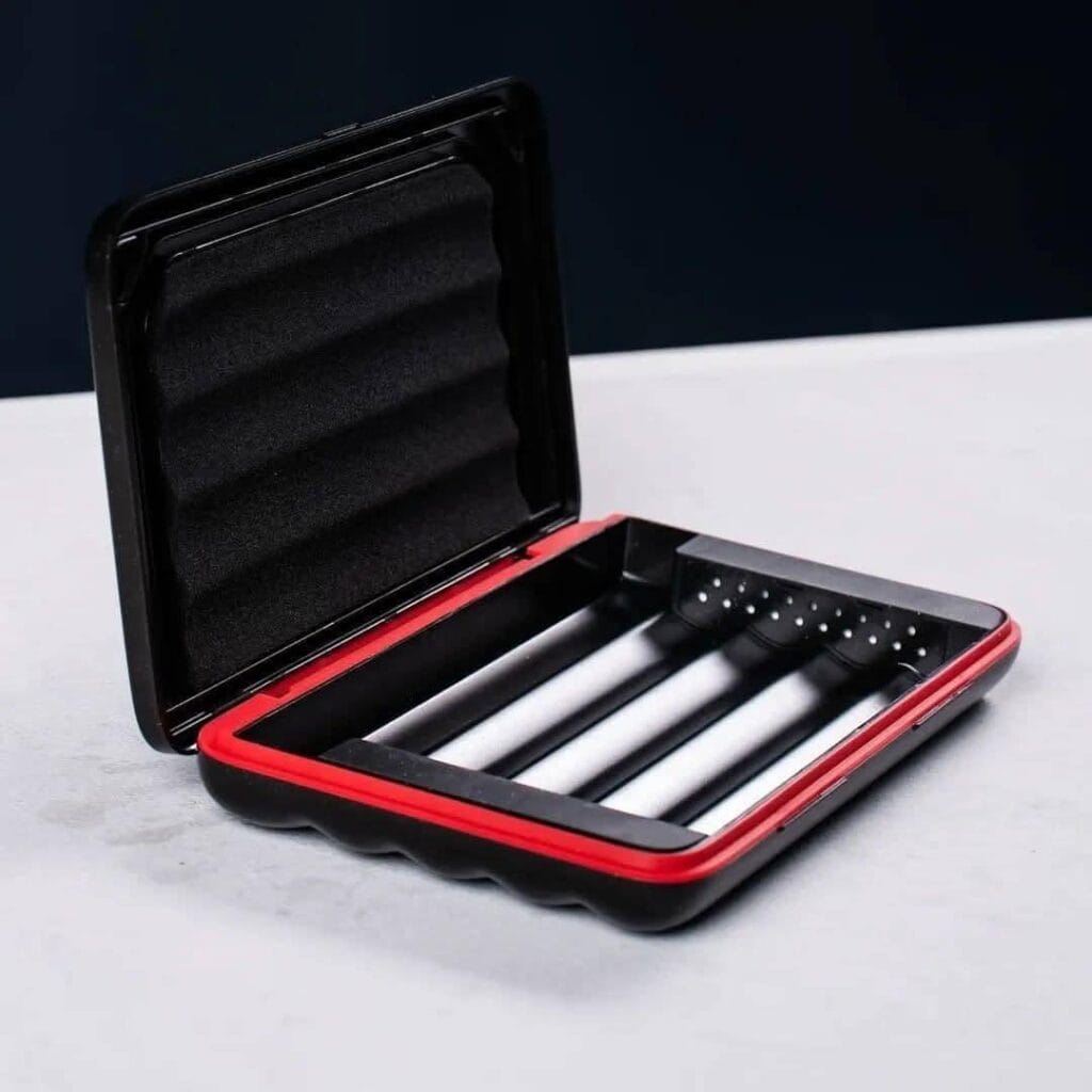 The NRNH Galaxy Travel Humidor featuring a matte black micro-textured finish with subtle golden starlight details.