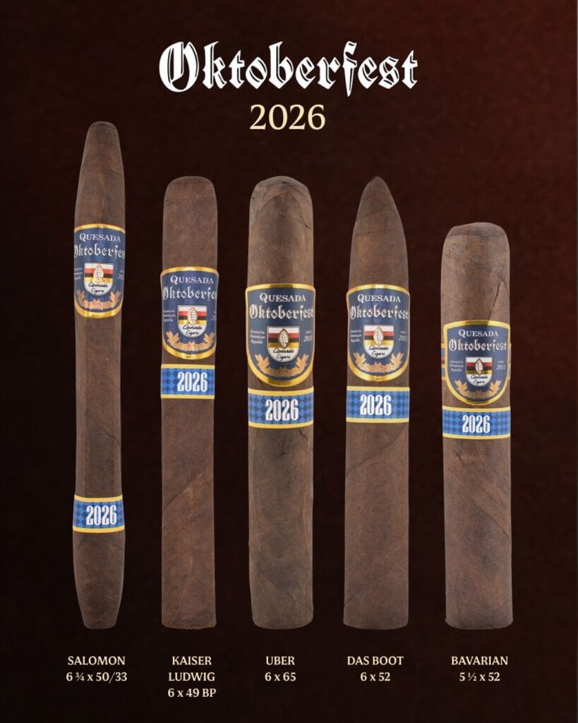Five Quesada Oktoberfest 2026 cigars with different shapes and sizes are shown upright against a dark background, each labeled with their name and dimensions below them. The Quesada Oktoberfest 2026 logo is prominently displayed at the top.